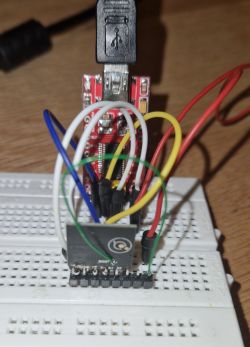 Connections on a breadboard with FTDI USB-to-Serial module and LN882H chip.