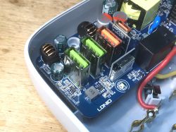 Interior of LDNIO SEW3452 Power Strip Interior of LDNIO SEW3452 power strip showing electronic components.