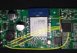Close-up of a circuit board with highlighted TX1 and I/O connections on WB3S module.