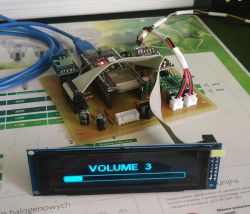 Audio player prototype with OLED display showing volume level