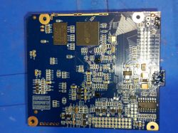 Zdjęcie płytki PCB z procesorem SPCA5330A-HB251 i innymi elementami elektronicznymi.