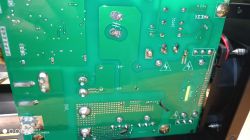 Close-up of Welding Machine Circuit Board Close-up of a green printed circuit board inside a welding machine.