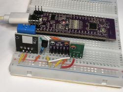 HLK-W801-KIT-V1.1 Development Board with Sensors HLK-W801-KIT-V1.1 development board with connected sensors on a breadboard.