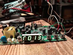 PCB board with display showing R013 and various electronic components