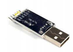 USB to TTL adapter with pins 5V, VCC, 3V3, TXD, RXD, and GND.