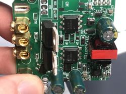 Internal structure of the ATLO-TB2-TUYA double touch light switch with CB3S module and triacs, view of the electronics without relays.