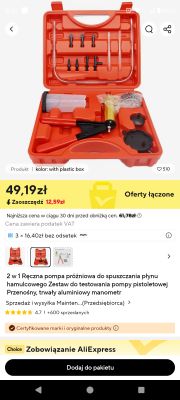 Zestaw do ręcznego pompowania próżniowego i testowania, w pomarańczowej walizce.