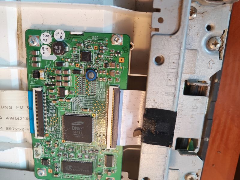 Circuit Board Inside a Flooded TV Circuit board inside a flooded TV with visible dirt.