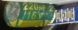 220µF Capacitor on Circuit Board 220µF 16V capacitor attached to a circuit board.