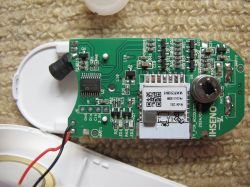 Interior of Tuya PIR/Alarm Device Interior of the Tuya PIR/alarm device with visible electronic components.