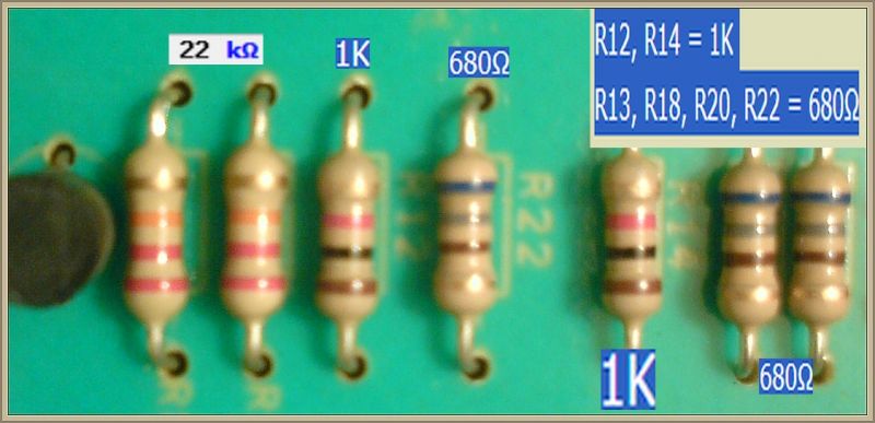 Zdjęcie rezystorów na płytce drukowanej z oznaczeniami wartości rezystancji.