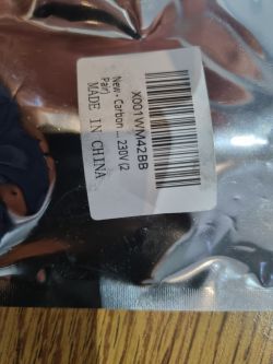 Etykieta na opakowaniu ze szczotkami węglowymi Made in China.
