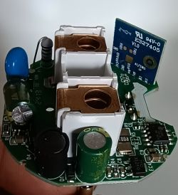Interior of EU Power Monitoring Plug JR-PM09 Interior of the plug with electronic components on a circuit board.