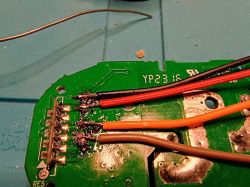 Circuit Board with Soldered Wires Circuit board with soldered wires of different colors.