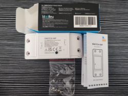 Wireless SWITCH-WF Wi-Fi switch with manual and packaging.