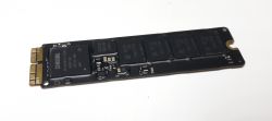 MacBook Pro A1502: Uszkodzony dysk SSD po upadku, brakujący element - identyfikacja