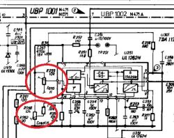 Fragment schematu elektronicznego z elementami w czerwonych obwódkach.