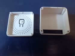 Photo of a plastic RMW002 case from AliExpress, showing its opening process.