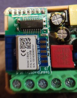 CB2S module with QR code label and HT66F3195 chip on a PCB in a MOES 2CH WiFi device.