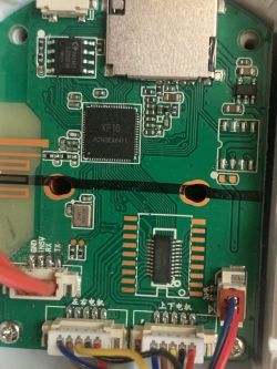 PCB with Integrated Circuits and Wires Close-up of a green printed circuit board with integrated circuits, connectors, and wires.