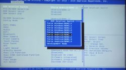 Menu zaawansowanych opcji BIOS-u AMI z rozwiniętym oknem wyboru BOM, prezentującym tryby systemów Windows i Android.