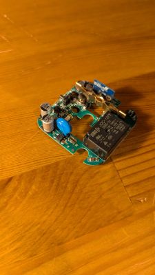 CATA CT-4010 smart plug PCB on a wooden surface