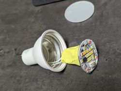 GU10 RGB Bulb with LN882HKI Module Open GU10 RGB bulb with visible electronic module.