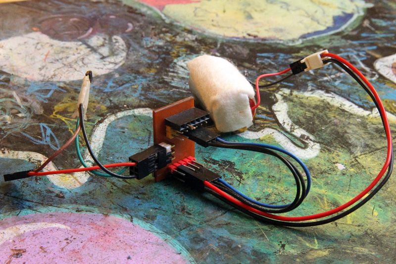 Close-up of DIY circuit with wires and ATtiny13 board