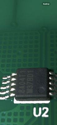 Photo shows a small IC with pins, soldered on a circuit board next to a larger module labeled CB3S.