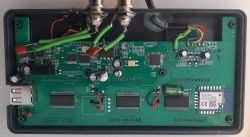 Inside of CB3S Water Monitor with Tuya Module Inside view of the CB3S water monitor with visible electronic components and Tuya module.