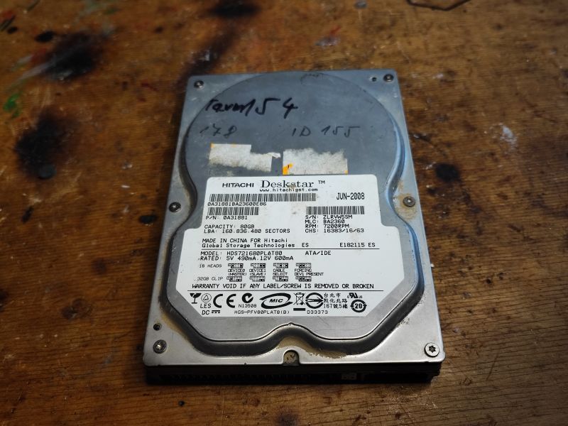 2008 Hitachi Deskstar Hard Drive Damaged Hitachi Deskstar hard drive from 2008.