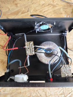Interior of a rectifier showing wiring and transformers.