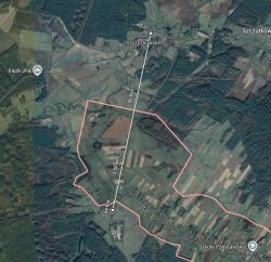 Zrzut mapy satelitarnej z linią pomiaru odległości 2,64 km i czerwoną granicą obszaru