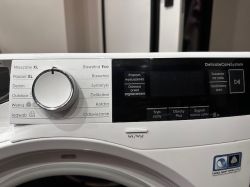 Panel sterowania suszarki Electrolux z pokrętłem programów i wyświetlaczem DelicateCareSystem