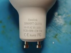 Close-up of Ewelink SMART GU10 bulb with printed technical specifications.