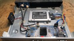 Samsung 850 EVO SSD mounted in case with connected SATA power and data cables