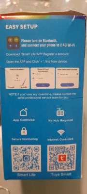 Smart home device packaging with setup instructions.