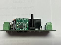 Printed circuit board with SM-028_V1.3 microcontroller module mounted on it.