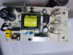 Charger circuit with electronic components on a printed circuit board.