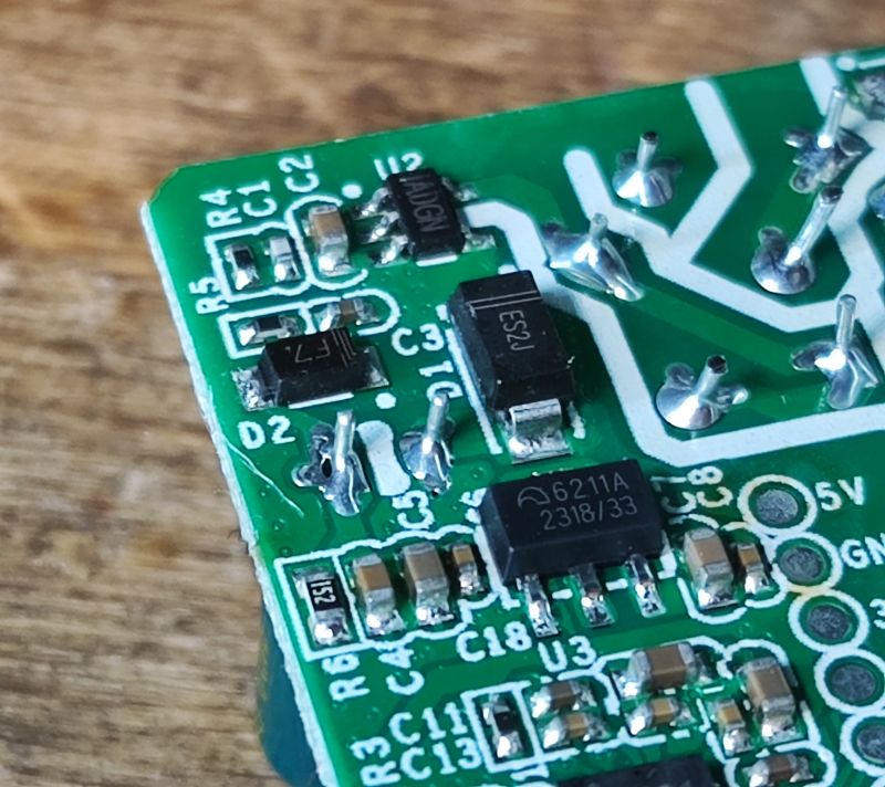 Sonoff ZBMini PCB Board Close-up of a PCB with electronic components.