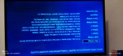 TV service menu displayed upside down on the screen.