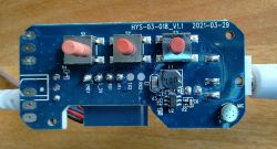 Circuit Board with Buttons and Components Circuit board with three red buttons and several electronic components.