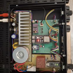 Top-down view of DIY radio internals with ESP32 and connected electronic modules