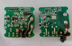 Damaged Smart Switches Two damaged electronic boards with burnt elements.
