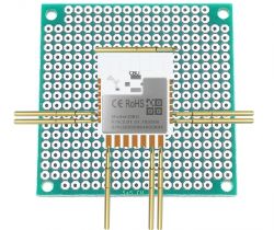 Prototype circuit board with soldered CBU module and pogo pins.