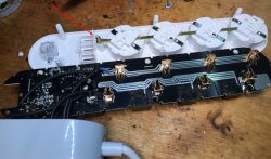 Interior of Overmax Flow Multi Control Power Strip Interior of a power strip with four sockets and circuit boards, showing electronic components.