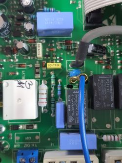 Close-up of a circuit board with various electronic components such as capacitors and resistors.