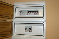 High-Pitched Sound from Fuse Box when 3.5 kW Air Conditioner is On in a 12.5 kW Apartment