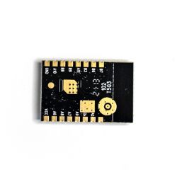 Electronic module with pin and component markings on a black board.
