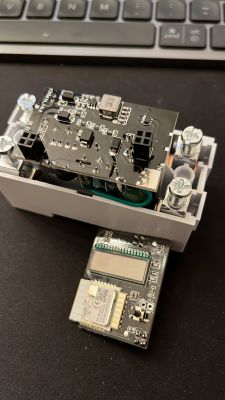 Interior of a Smart Energy Meter with Relay Board Open interior of a smart energy meter showing the relay board and other components.